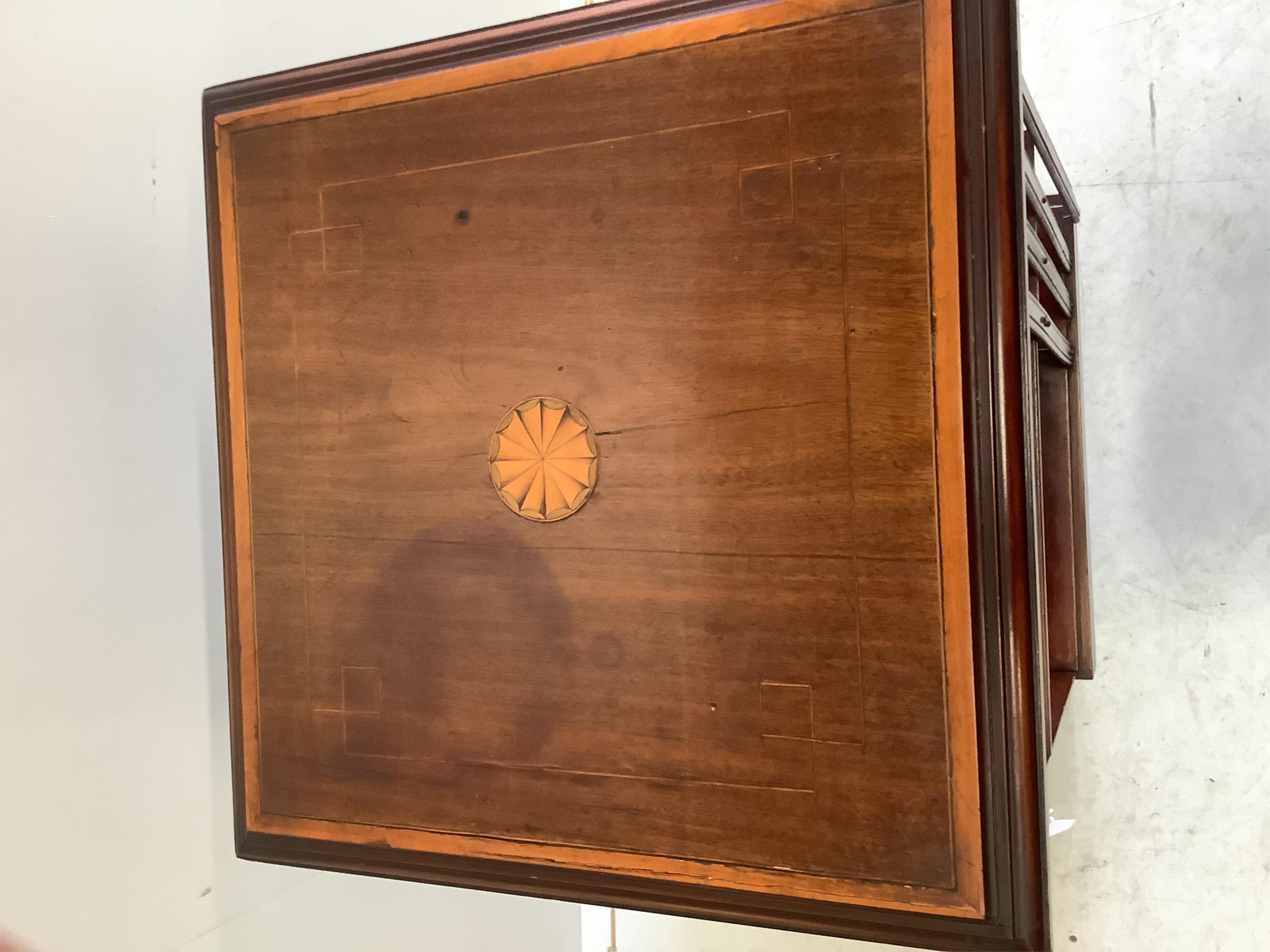 An Edwardian satinwood inlaid mahogany revolving bookcase, 48cm sq., height 88cm